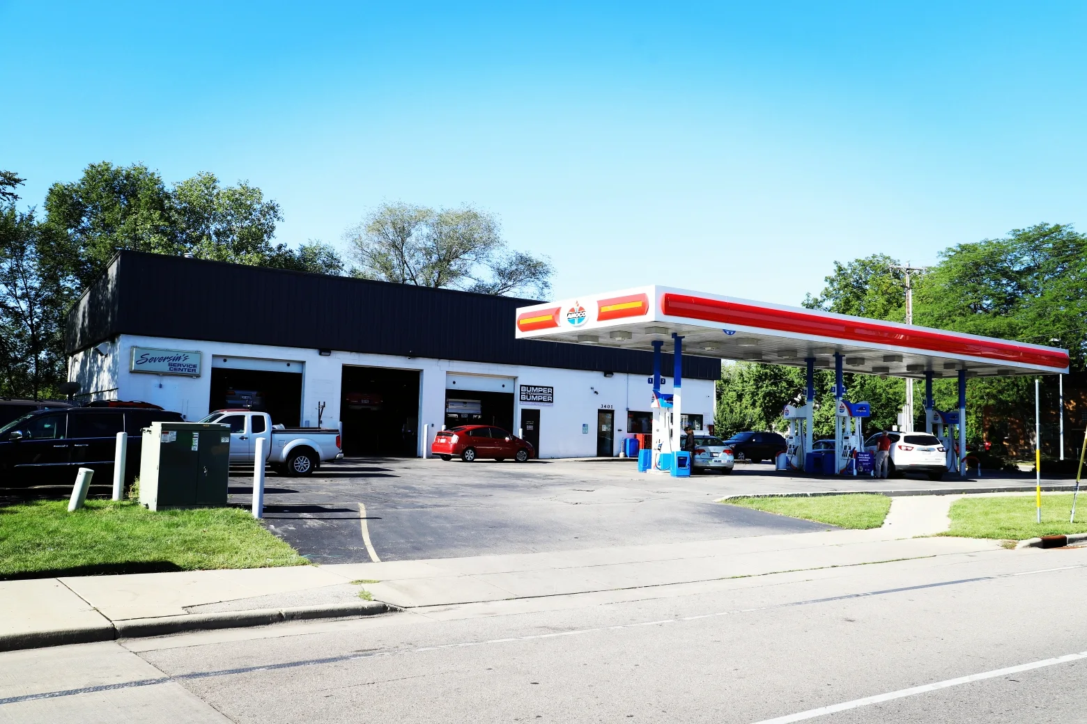Seversin's corner building with its Amoco pumps, convenience store and car wash on Milwaukee Street